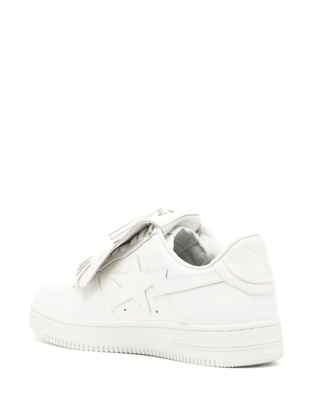 A BATHING APE® tenis capitonados con borla