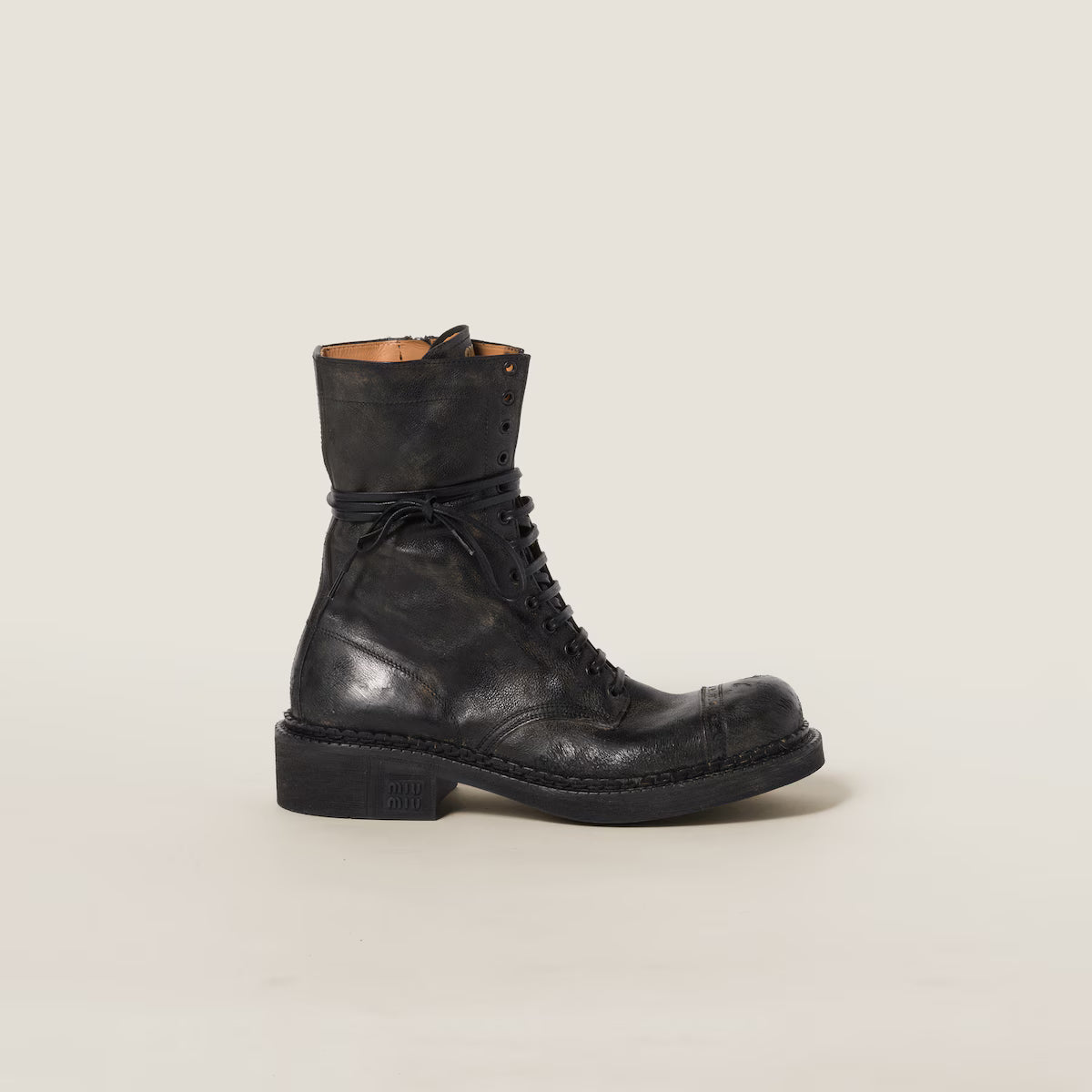 Botines Miu Miu de piel con cordones