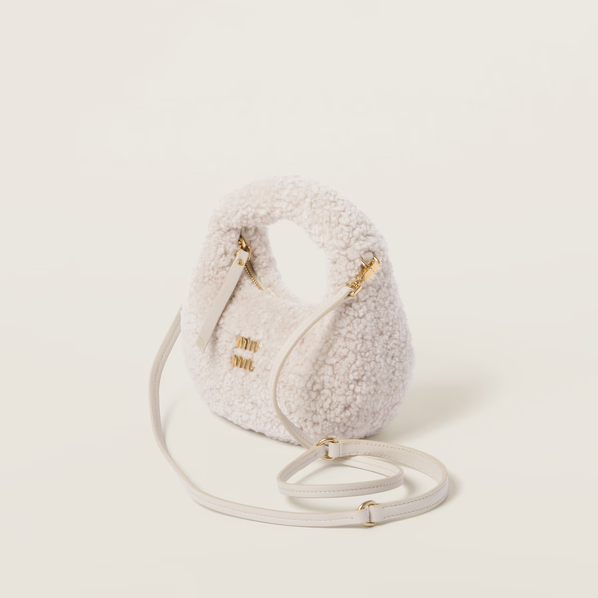 Miu Miu Bolso hobo Wander de borreguillo con detalles de piel