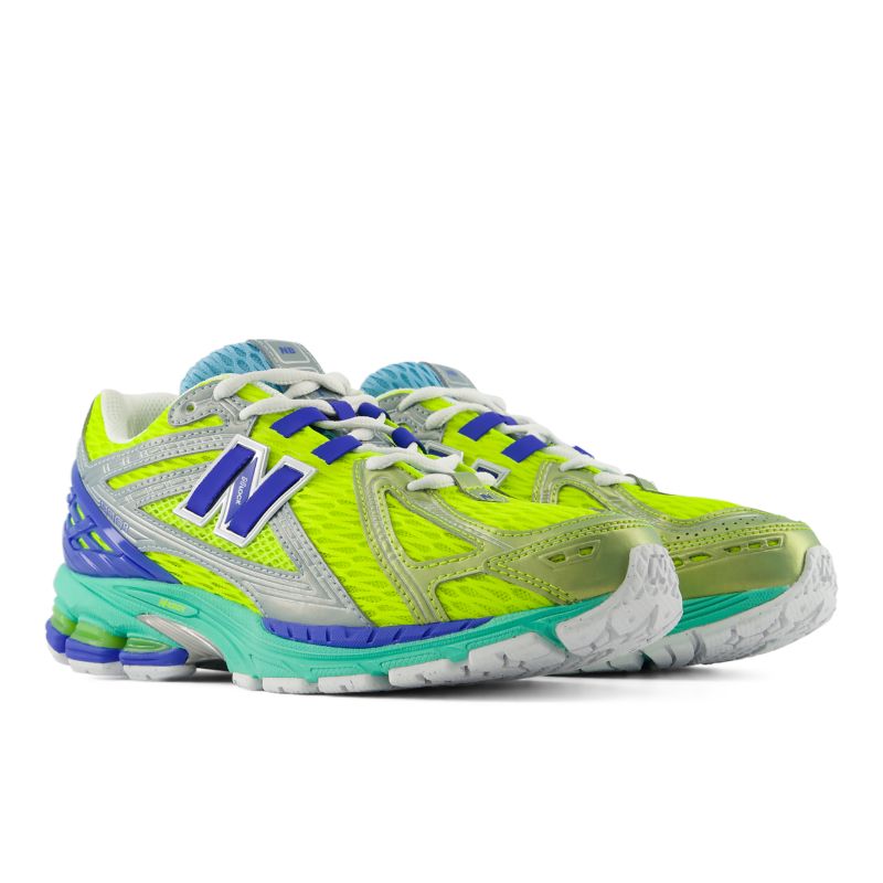 New Balance tenis con detalle del logo 1906 | U19063EN