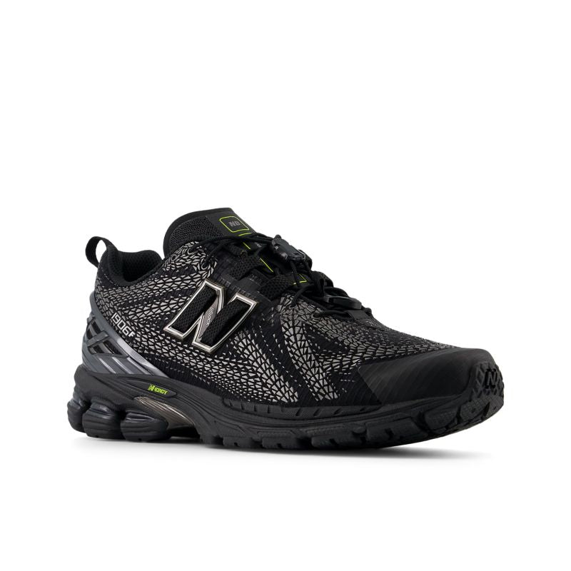 New Balance tenis con detalle del logo 1906