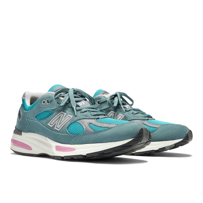 New Balance tenis con parche del logo y paneles | U991TT2