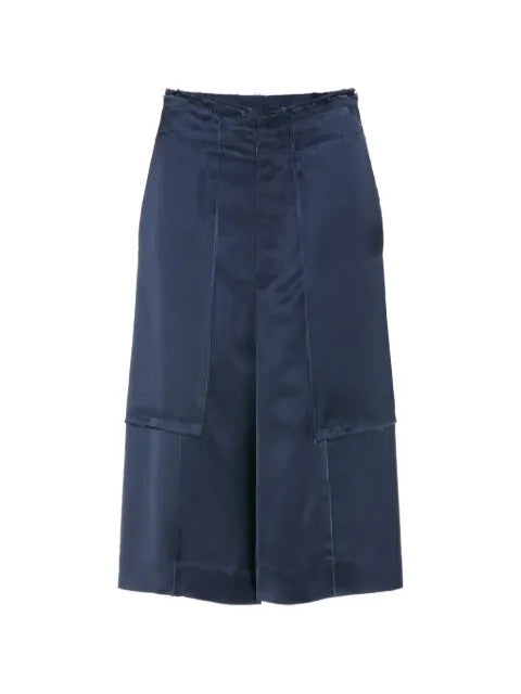 Maison Margiela shorts con detalles de panel y bordes deshilachados - imagen 1