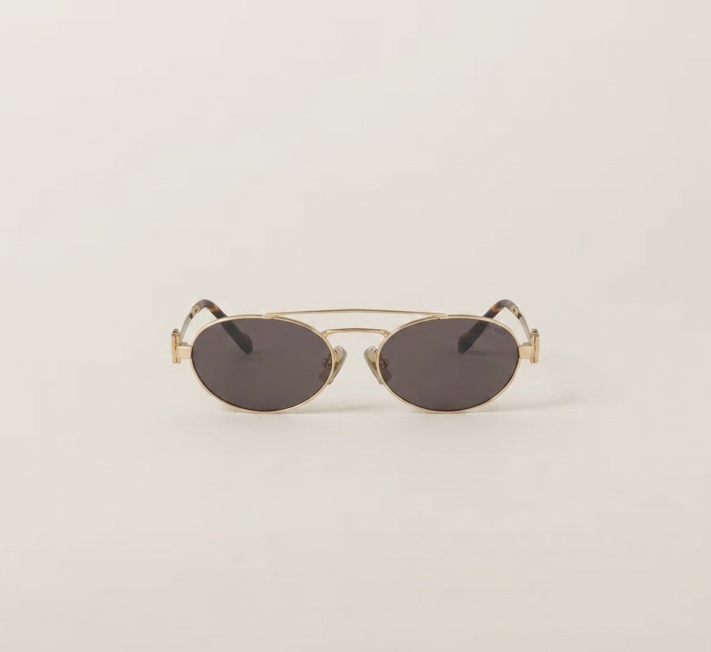 Miu Miu Eyewear lentes de sol con armazón redonda y logo