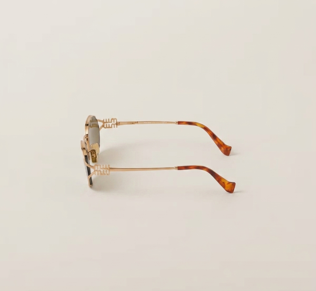 Miu Miu Eyewear lentes de sol con armazón redonda y logo