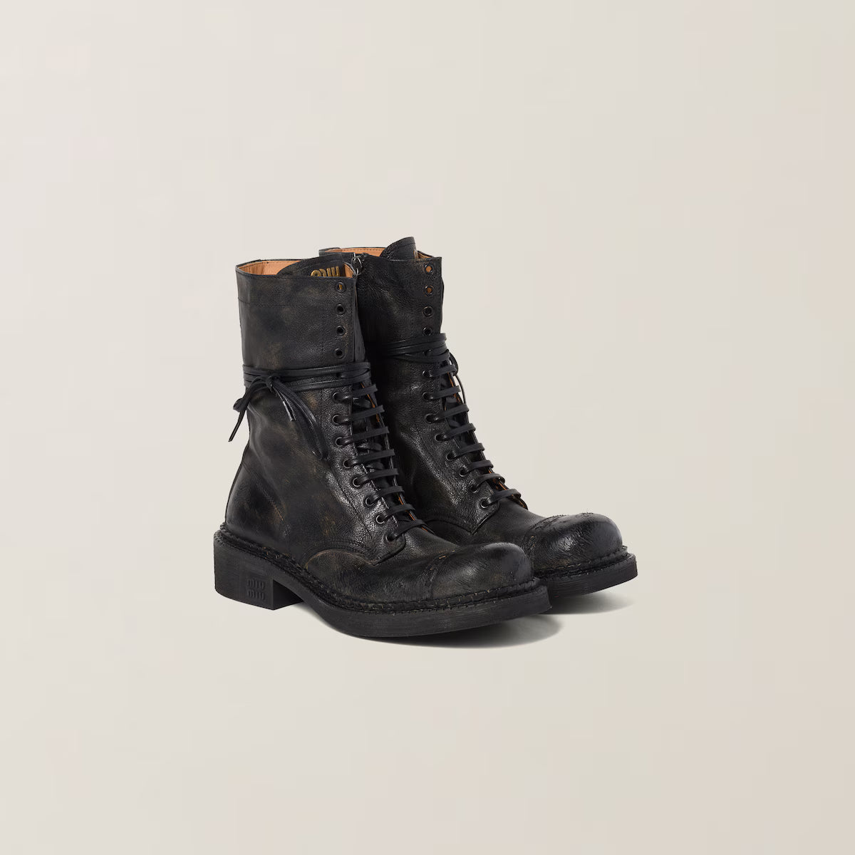 Botines Miu Miu de piel con cordones