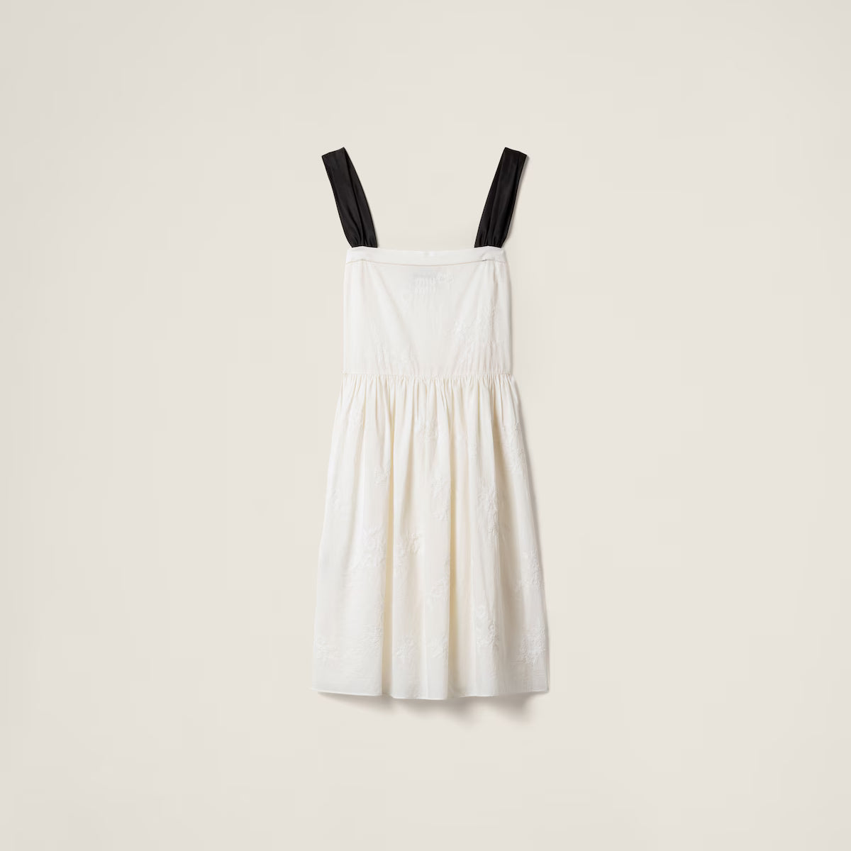 Vestido Miu Miu de batista con bordados