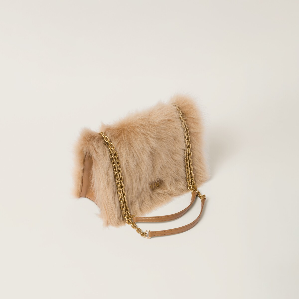 Miu Miu Bolso de borreguillo con detalles de piel