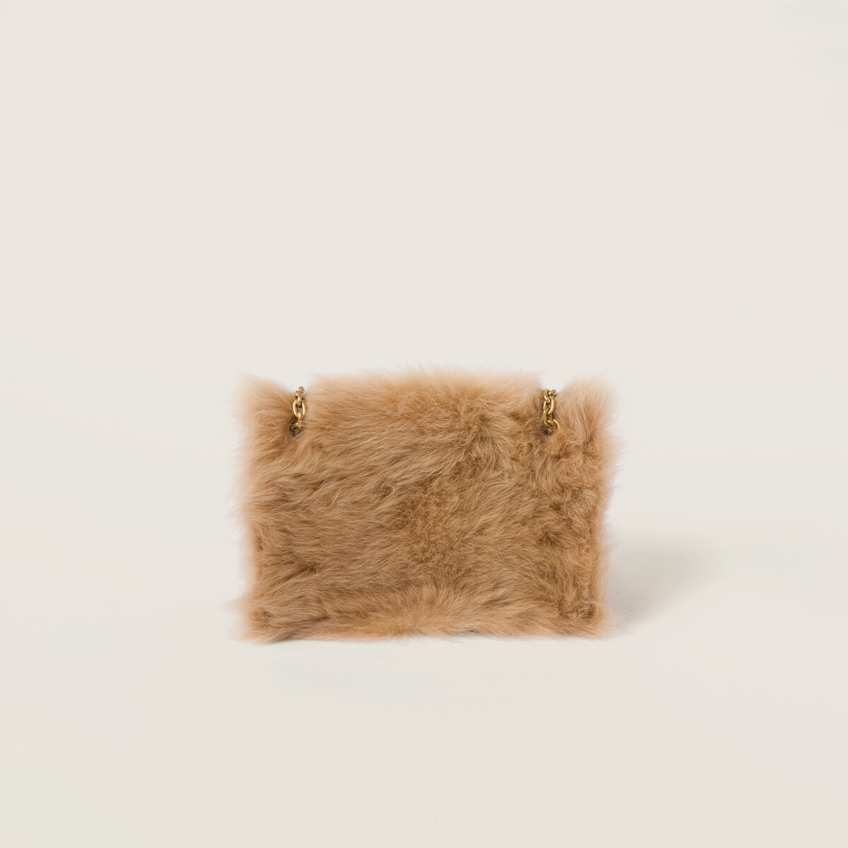 Miu Miu Bolso de borreguillo con detalles de piel