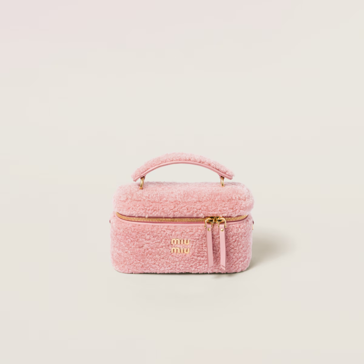 Miu Miu Bolso bandolera de borreguillo con detalles de piel