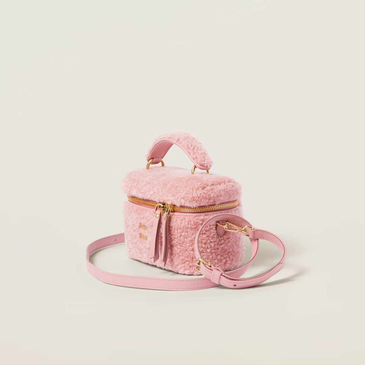 Miu Miu Bolso bandolera de borreguillo con detalles de piel