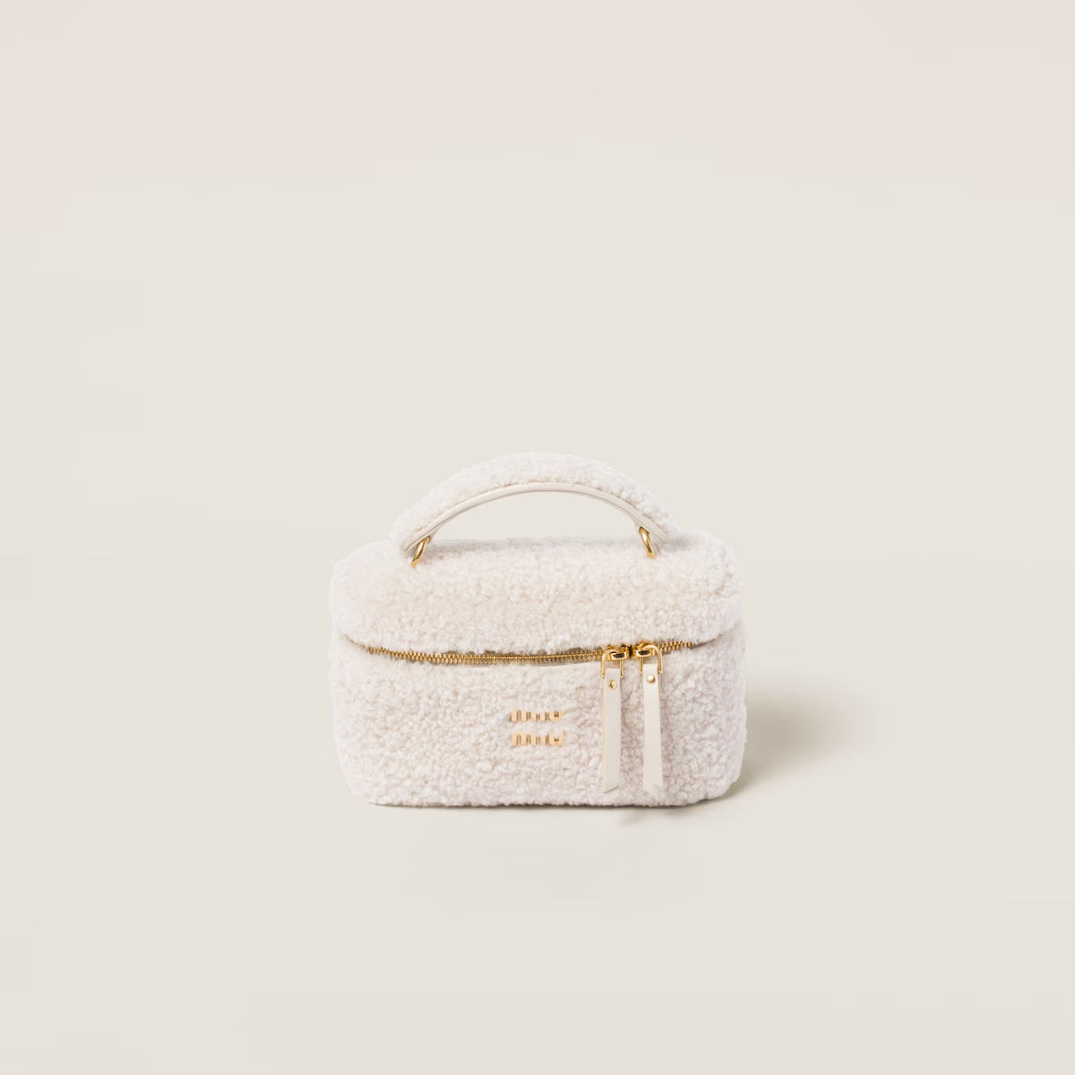 Miu Miu Bolso bandolera de borreguillo con detalles de piel