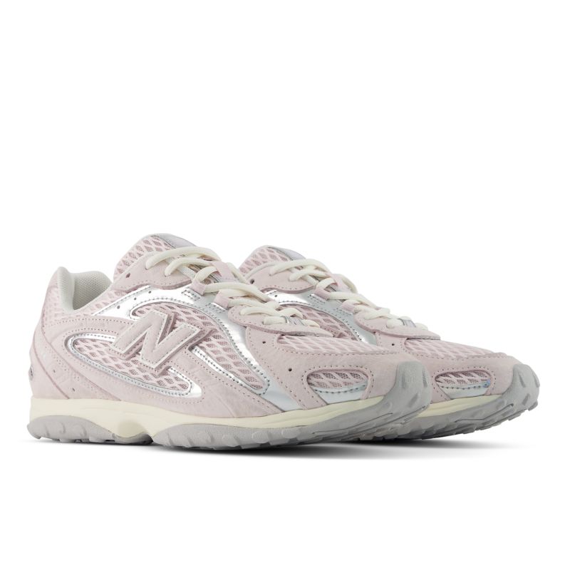 New Balance tenis de gamuza con paneles de malla | U204L210