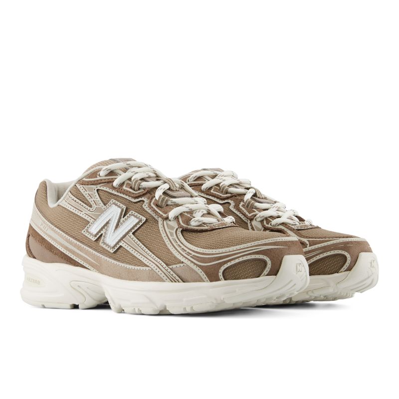 New Balance tenis con parche del logo y paneles | U7403TR